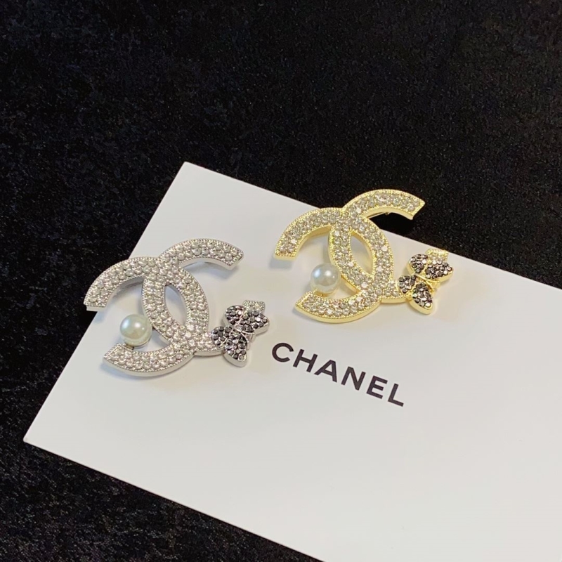 Ch**el brooches